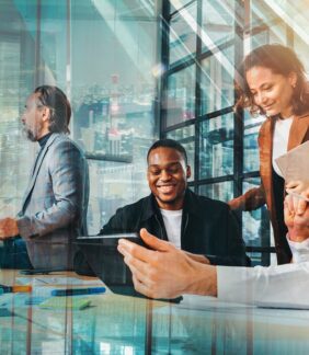 Group of business people have a meeting about company stats Group of business people have a meeting about company statistics
